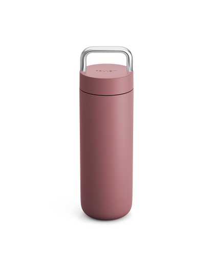 Fellow Carter Carry Travel Mug in Desert Rose, upright with silver handle on white background.
